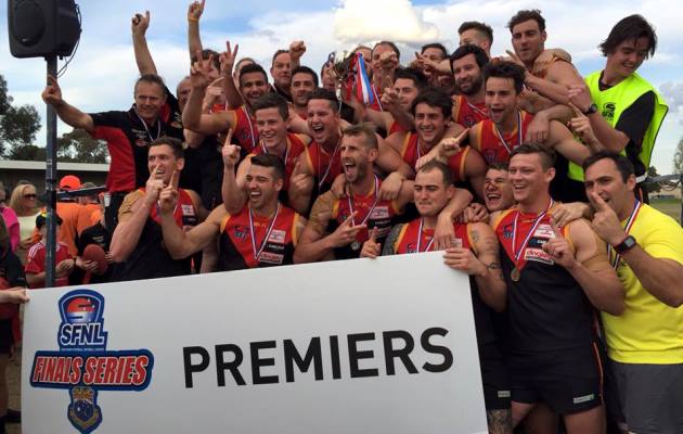 The all-conquering Dingoes salute their maiden Division 1 Senior premiership.
