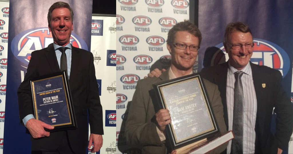Peter Mair (left) and Sam Anstey accept their AFL Victoria awards.