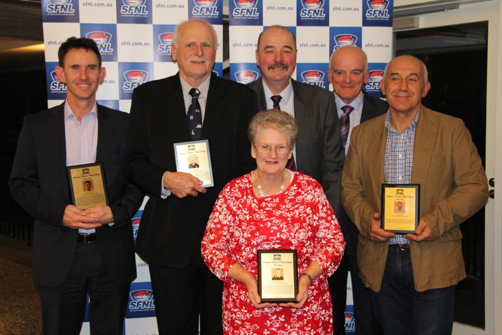 The 2016 SFNL Hall of Fame inductees pose with their plaques