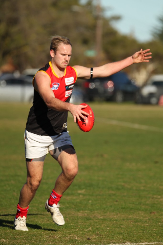 Dingoe Dan Farmer poses a serious threat both through the midfield and in attack.