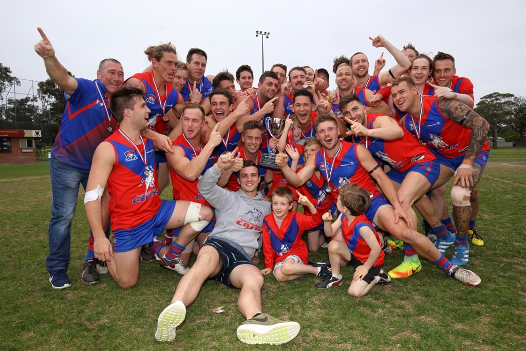 To the victors the spoils! The Colts celebrate the Senior and Reserve premierships. CREDIT: Julian Inglese, Photogenix
