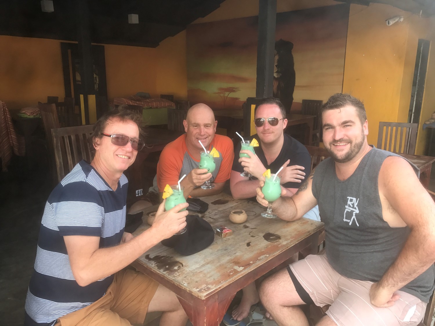 (From left) Mark Bassett, Troy Beard, Jason Bird and Jay Cavanagh enjoy a cool beverage.
